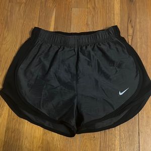Grey and black Nike running shorts